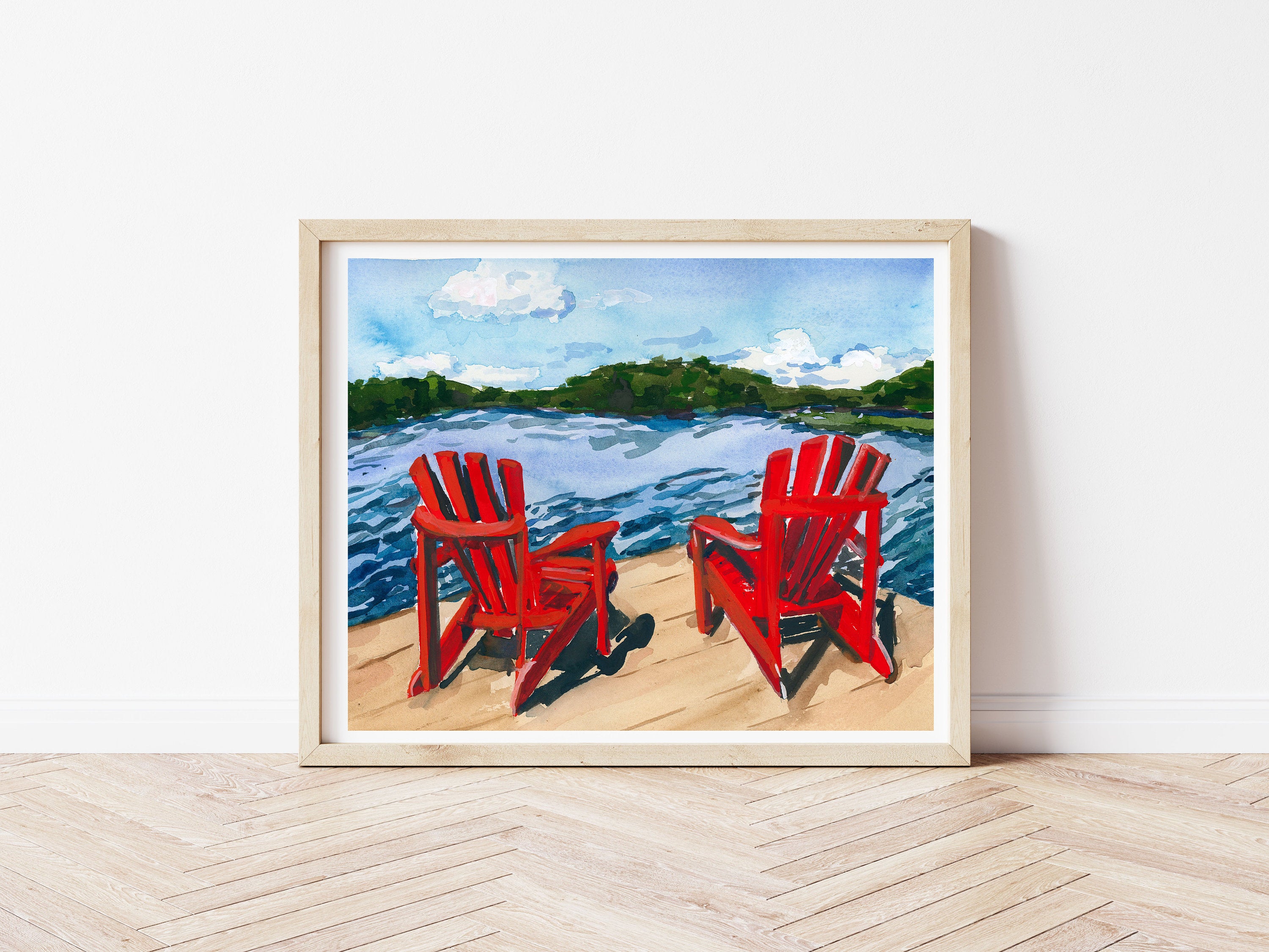 Muskoka chairs at the cottage print of painting by Medjool Studio. Print of original gouache painting featuring a scene of muskoka chairs overlooking a lake during an iconic Eastern Canadian summer.