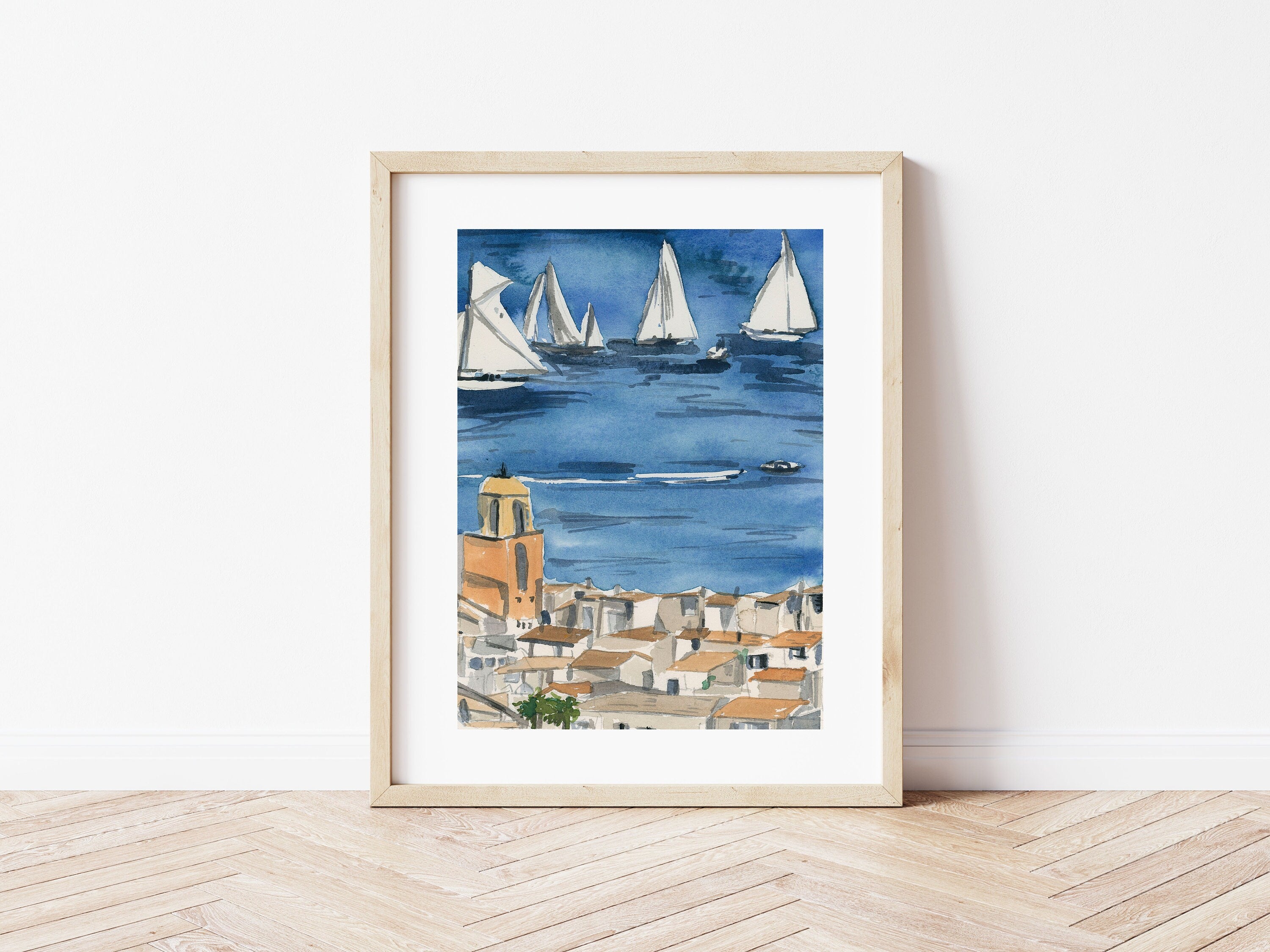 Saint Tropez print of painting by Medjool Studio. Print of a watercolor painting of the the French Rivera town, Saint Trope. This French seaside village has beautiful terracotta and yellow colours.