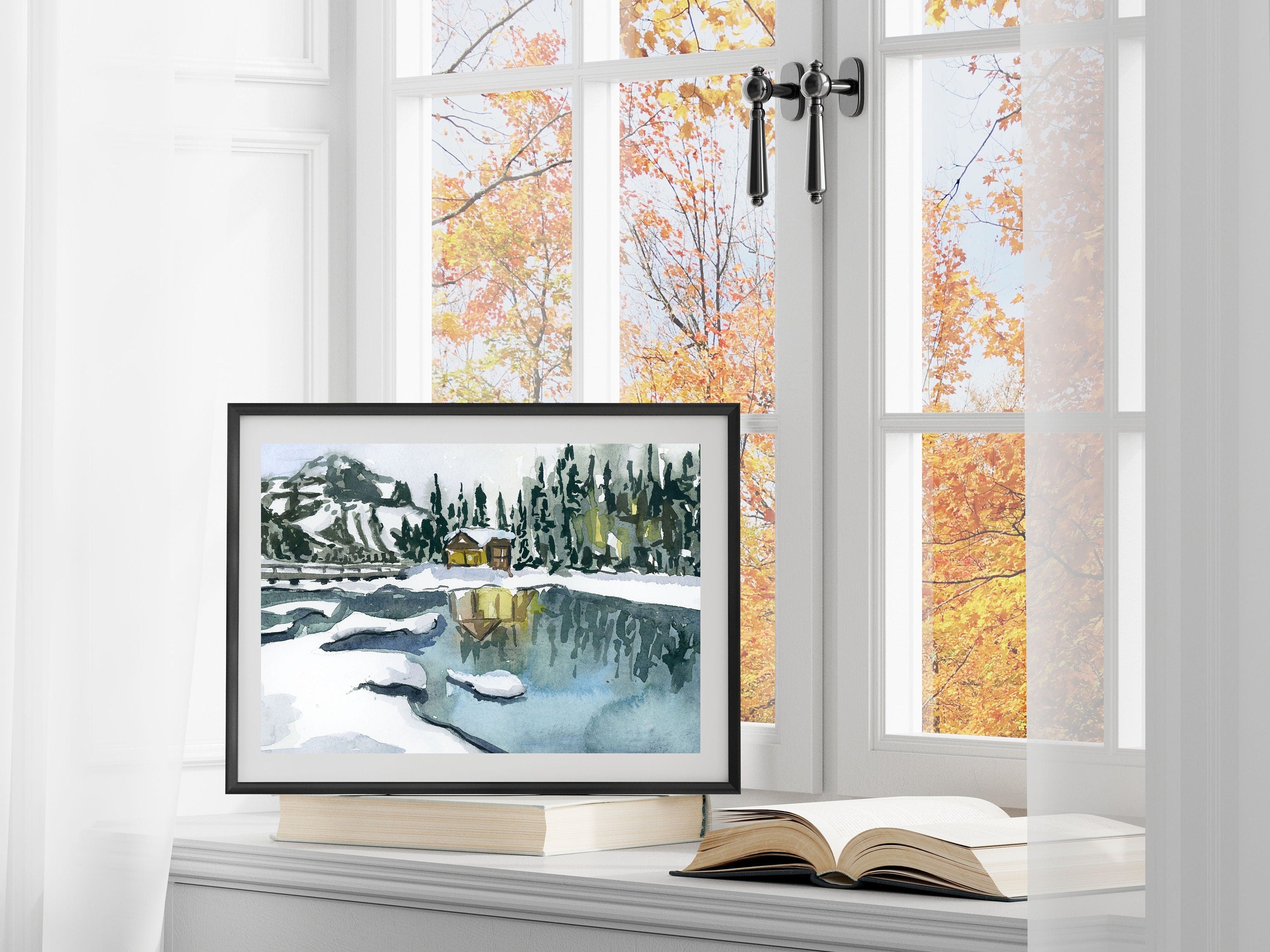 Winter forest and cabin on a lake print of painting by Medjool Studio. Print of an original gouache painting of a cabin lit up an in a winter forest on a lake.