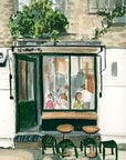 London cafe print of painting by Medjool Studio. Print of original gouache painting of a coffee shop in London, England full of customers and two small tables with stools out front.